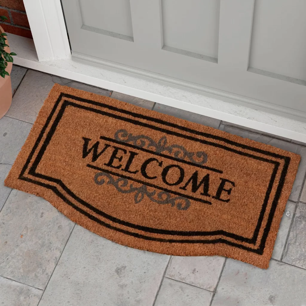 Door mat with welcome written on it