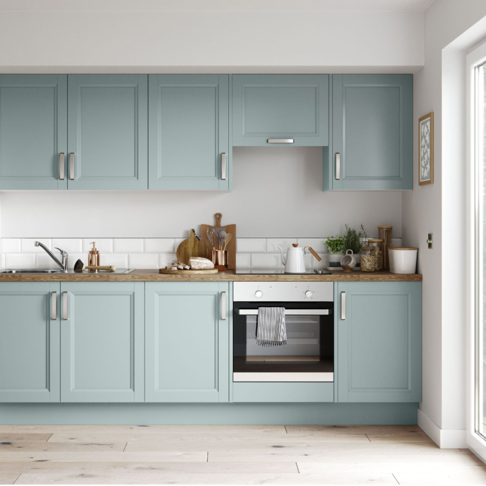 diy home improvements of painted kitchen cabinets to light blue colour