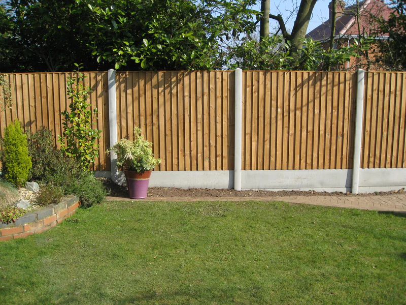 wooden fence panels with concrete fence posts