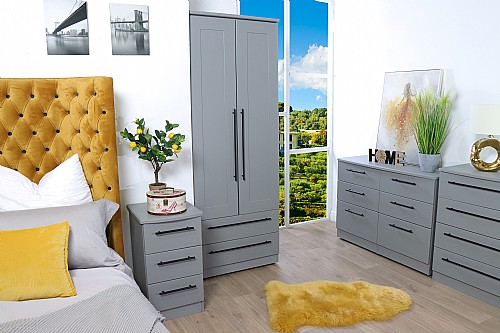 Set of grey Ready Assembled Bedroom Furniture. Including wardrobe, chest of draws and bedside table