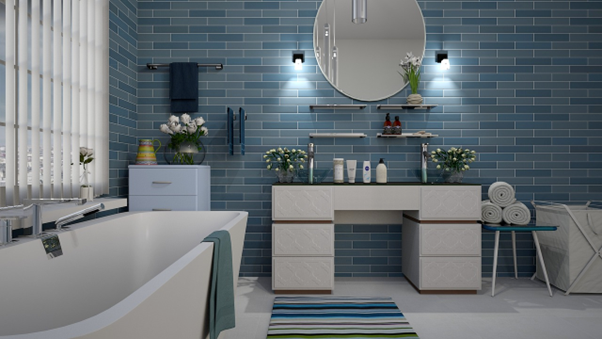 Bathroom with small blue wall tiles and white porcelain floor tiles