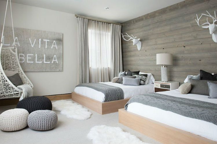Scandinavian inspired bedroom with greys and white bedding and decor 