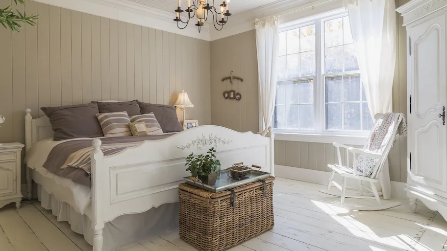farm house style bedroom. White 4 poster bed with light grey bedding